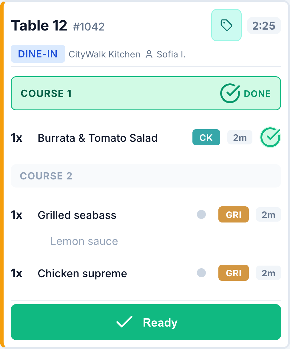 KDS order for Table 12 with the first course done and the second course pending