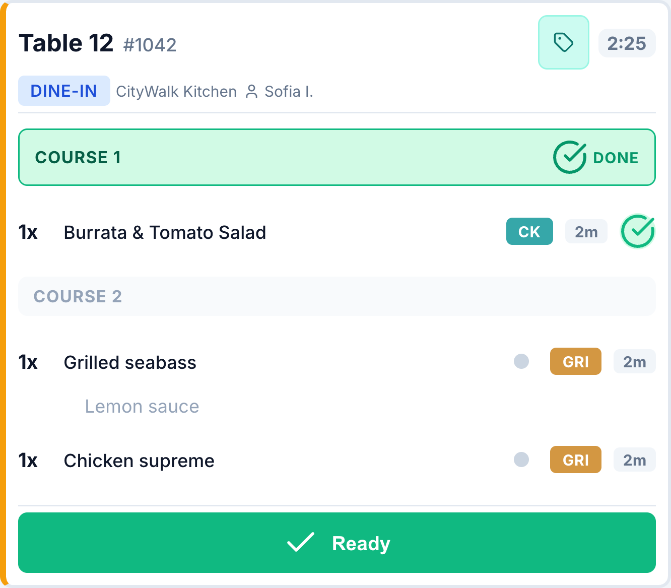 KDS order for Table 12 with the first course done and the second course pending