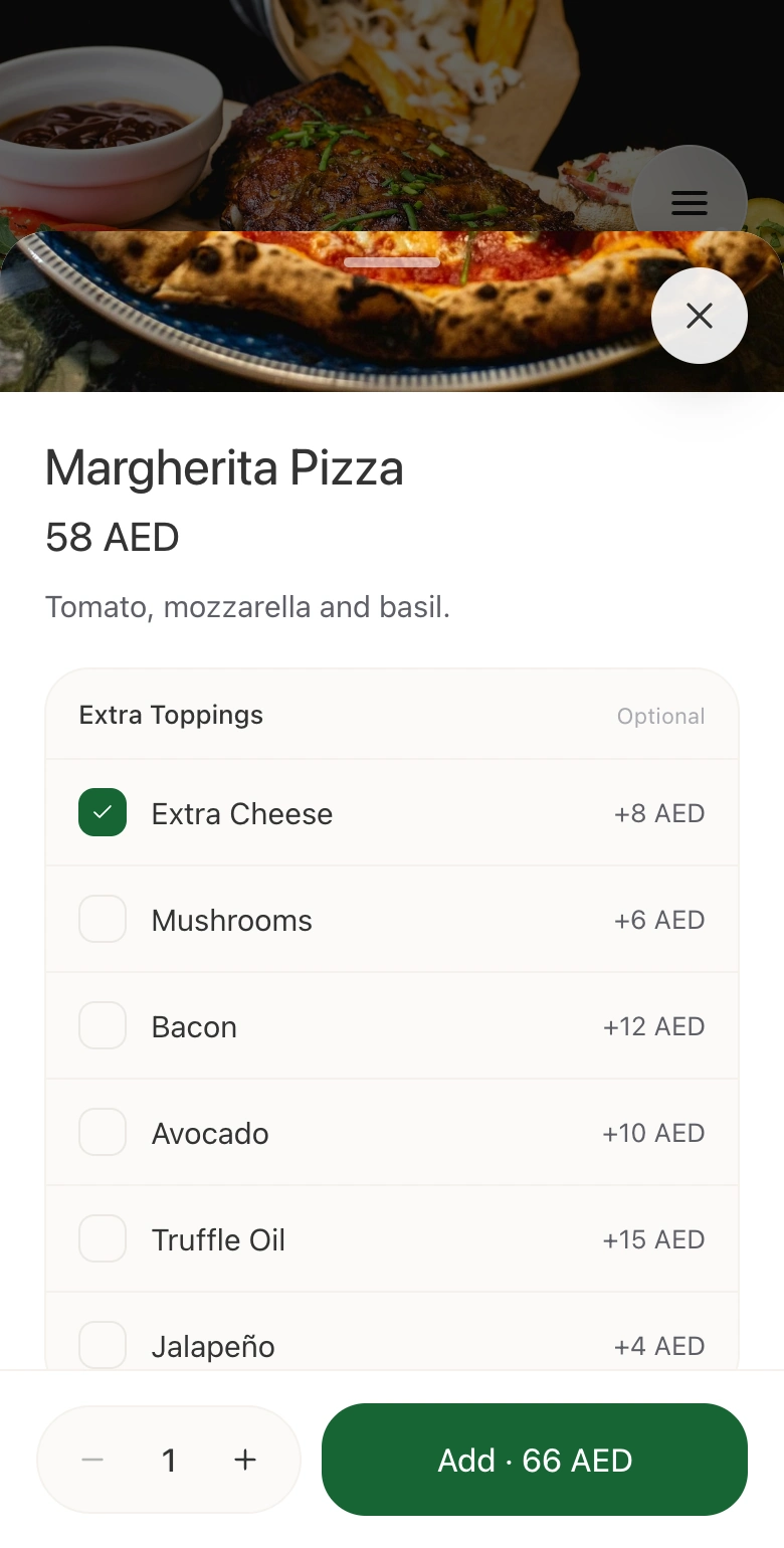 Margherita Pizza in the real ordering website, with priced extra toppings